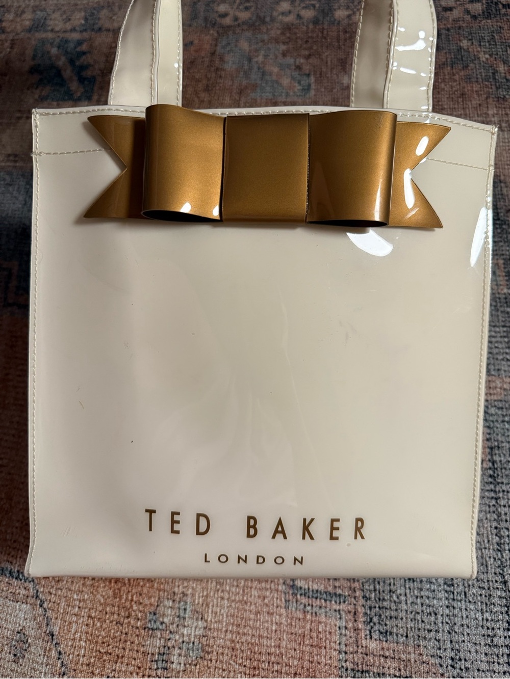 Ted Baker Cream Patent Tote with Gold Accent Bow